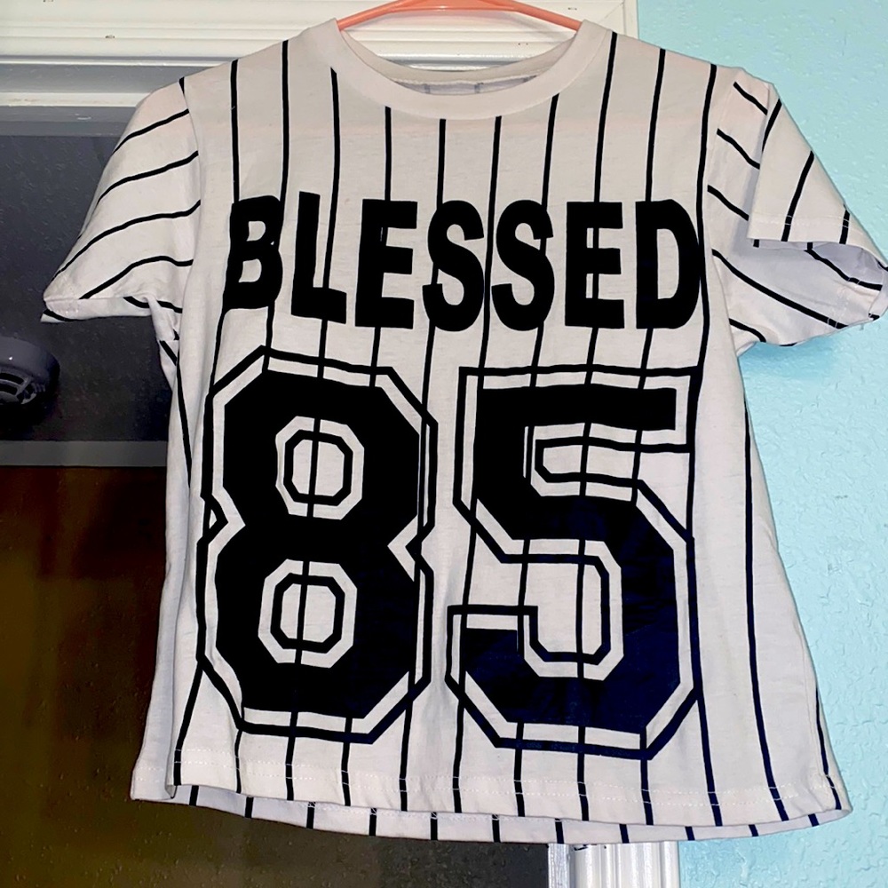 I’m selling a White on fire shirt